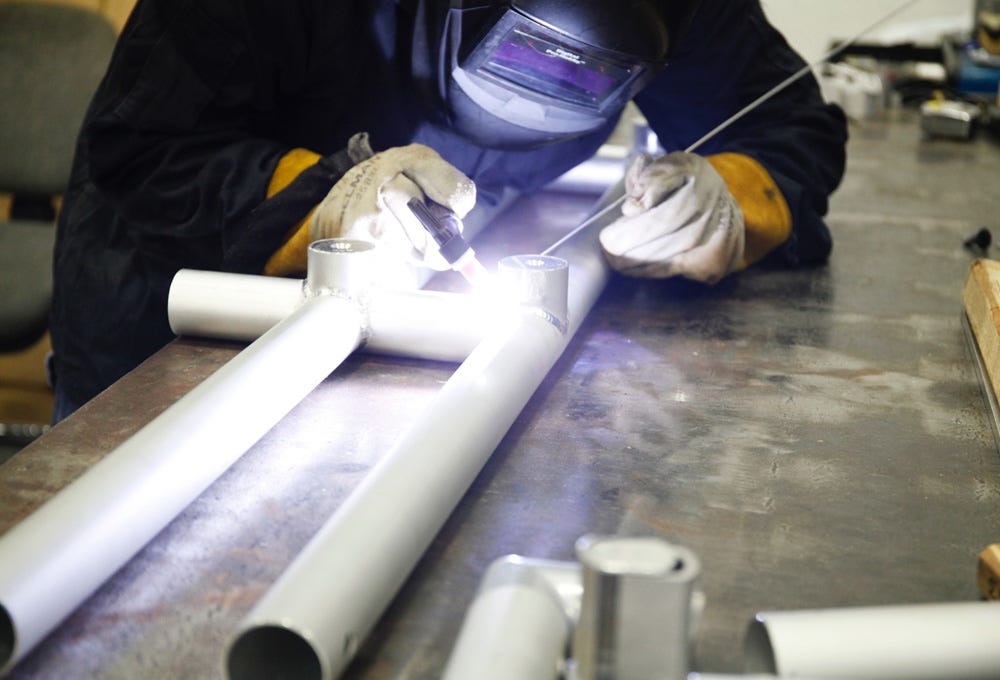 Metal tube structures made for custom printed fabric Metal tube structures made for custom printed fabric