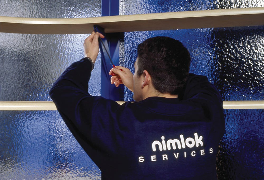 Nimlok trade show booth being installed Nimlok trade show booth being installed